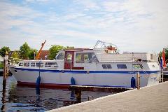 10834
