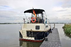 23687